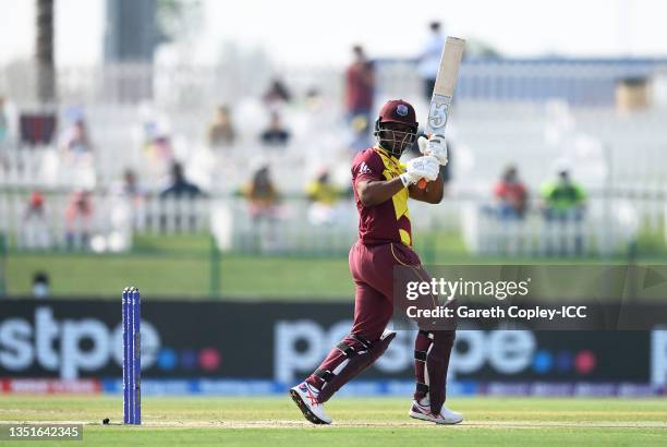 Evin Lewis of West Indies plays a shot during the ICC Men's T20 World Cup match between Australia and Windies at Sheikh Zayed stadium on November 06,...