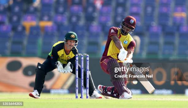 Evin Lewis of West Indies plays a shot as Matthew Wade of Australia keeps during the ICC Men's T20 World Cup match between Australia and Windies at...