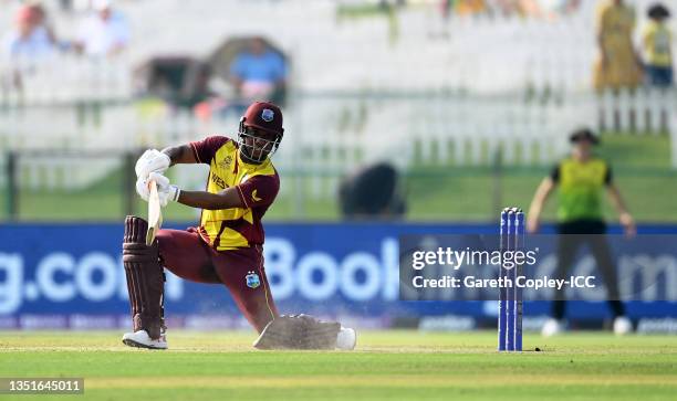 Evin Lewis of West Indies plays a shot during the ICC Men's T20 World Cup match between Australia and Windies at Sheikh Zayed stadium on November 06,...