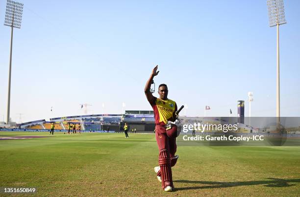 Dwayne Bravo of West Indies makes their way off after being dismissed for 10 by Josh Hazlewood of Australia in their final innings before retiring...