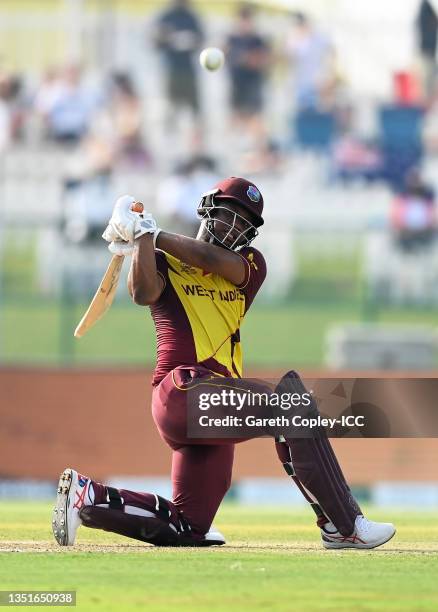 Evin Lewis of West Indies plays a shot during the ICC Men's T20 World Cup match between Australia and Windies at Sheikh Zayed stadium on November 06,...