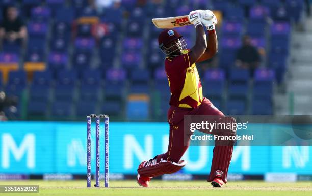 Andre Russell of West Indies plays a shot during the ICC Men's T20 World Cup match between Australia and Windies at Sheikh Zayed stadium on November...