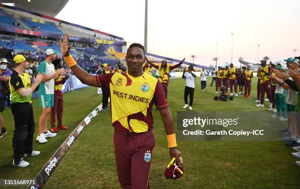 Dwayne Bravo of West Indies makes their way through a guard of honour following the ICC Men's T20 World Cup match between Australia and Windies at...