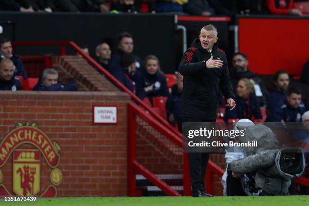 Ole Gunnar Solskjaer, Manager of Manchester United gives their team instructions during the Premier League match between Manchester United and...