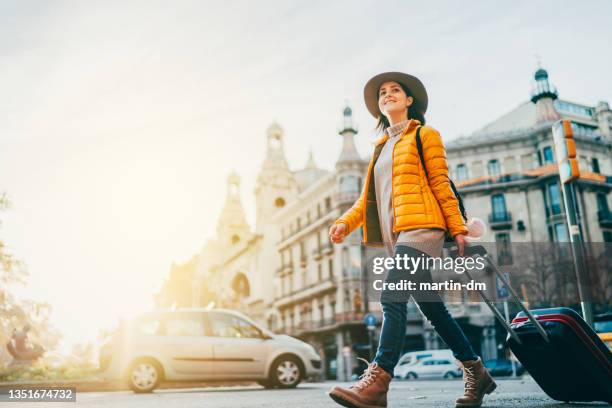 traveller only - yellow suitcase stock pictures, royalty-free photos & images