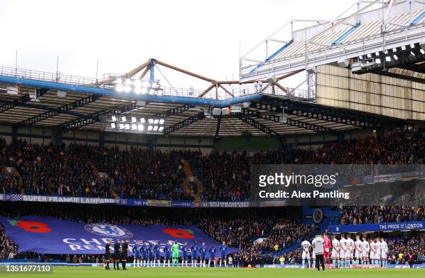Players, fans and officials observe a minutes silence in respect of the Remembrance Day proceedings prior to the Premier League match between Chelsea...
