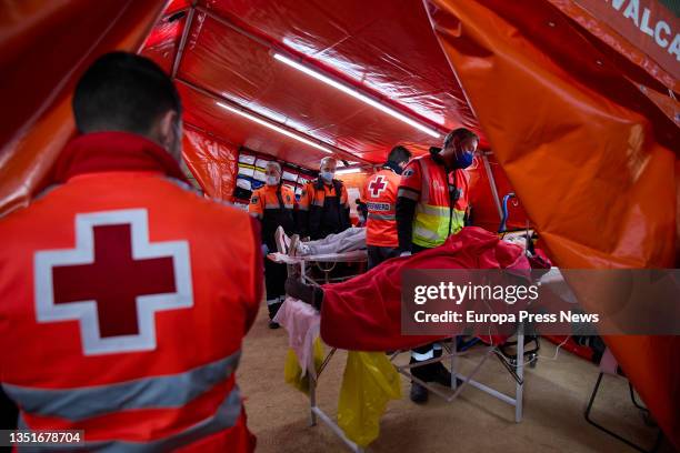 Red Cross and SUMNA-Proteccion Civil personnel simulate an evacuation of injured people during a day that includes several emergency drills on...