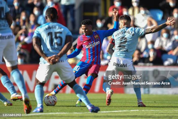 Ansu Fati of FC Barcelona scores their team's first goal during the La Liga Santander match between RC Celta de Vigo and FC Barcelona at...