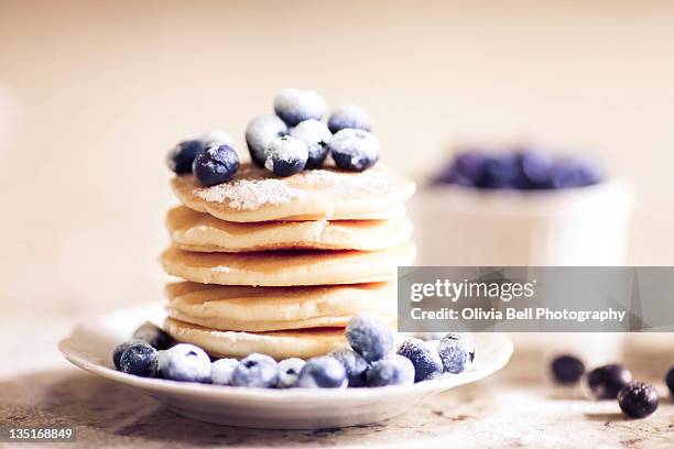 pancake tuesday with blueberries - pancake day stock-fotos und bilder