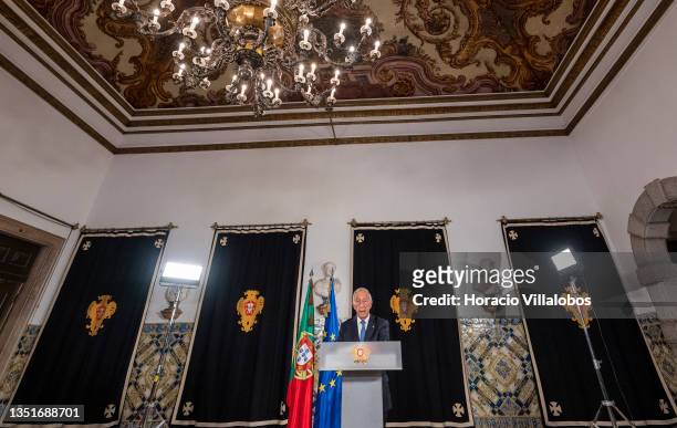 Portuguese President Marcelo Rebelo de Sousa stands alone at Sala das Bicas in Belem Presidential Palace as he speaks to the country to announce the...