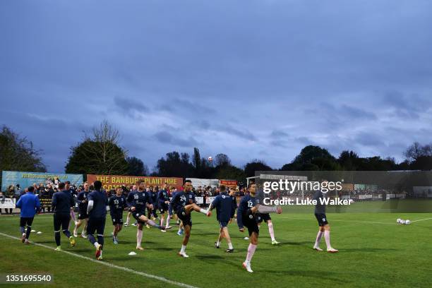 Barrow players warm up prior to the Emirates FA Cup First Round match between Banbury United and Barrow at Spencer Stadium on November 06, 2021 in...