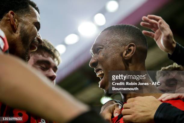 Jaidon Anthony of Bournemouth celebrates with team-mates after he scores a goal to make it 3-0 during the Sky Bet Championship match between AFC...