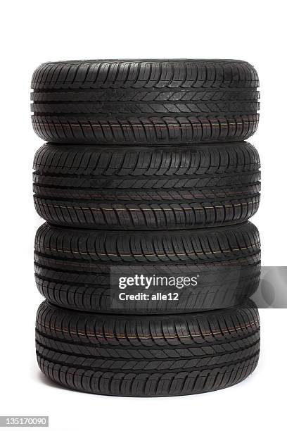 tires apilado - neumaticos fotografías e imágenes de stock