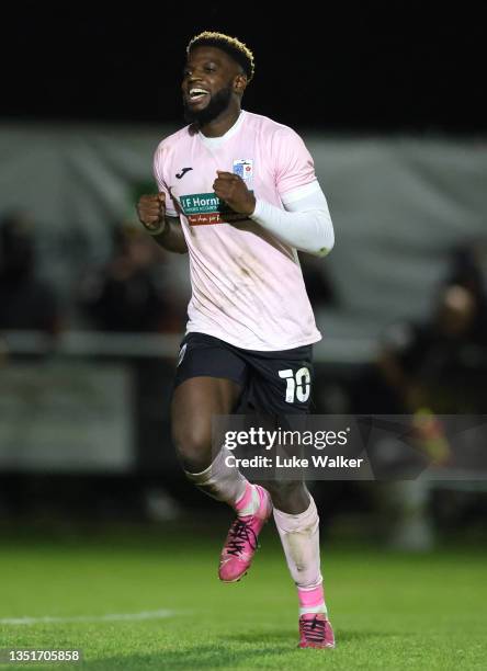 Offrande Zanzala of Barrow celebrates after scoring their team's second goal during the Emirates FA Cup First Round match between Banbury United and...