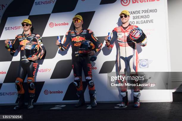 Remy Gardner of Australia and Red Bull KTM Ajo, Raul Fernandez of Spain and Red Bull KTM Ajo and Fabio Di Giannantonio of Italy and Federal Oil...