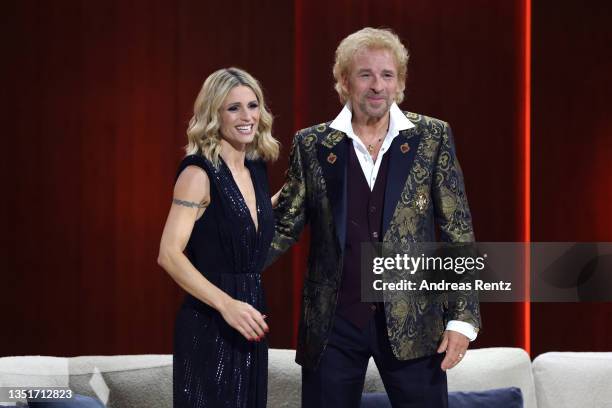 Hosts Michelle Hunziker and Thomas Gottschalk speak during the 40th anniversary of the tv show "Wetten, dass...?" on November 06, 2021 in Nuremberg,...