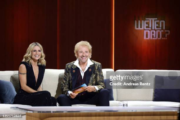 Hosts Michelle Hunziker and Thomas Gottschalk speak during the 40th anniversary of the tv show "Wetten, dass...?" on November 06, 2021 in Nuremberg,...