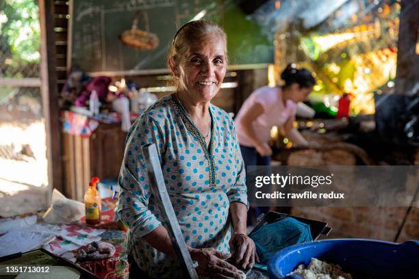 making tortillas with a smile - mexican rustic stock pictures, royalty-free photos & images