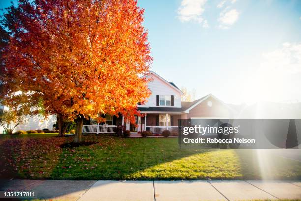 exterior of two story house in autumn - illinois suburb stock pictures, royalty-free photos & images