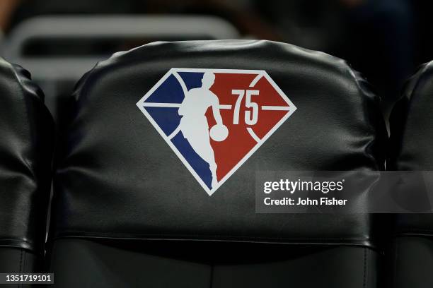 Picture of the 75th anniversary logo on the back of the players chairs during the game at Fiserv Forum on November 05, 2021 in Milwaukee, Wisconsin....