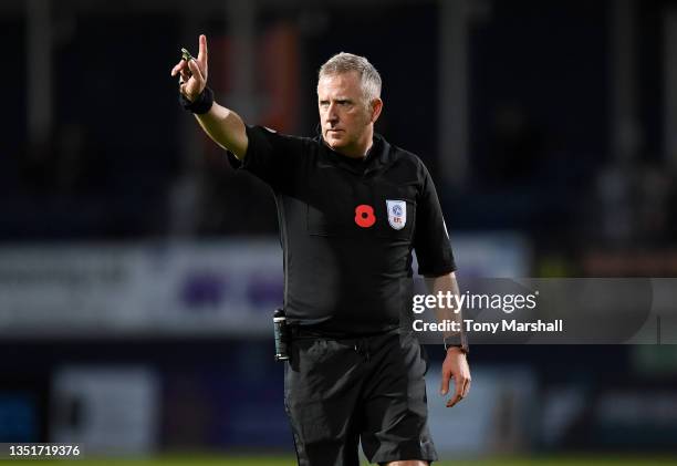 Referee Jonathan Moss gestures during the Sky Bet Championship match between Luton Town and Stoke City at Kenilworth Road on November 06, 2021 in...