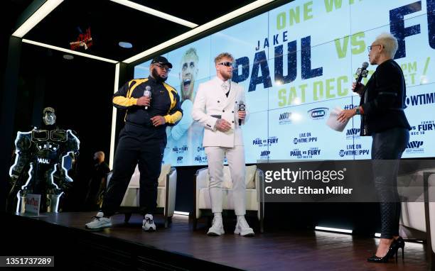 Jake Paul's mascot The Problem Bot looks on as comedian Drew "Druski" Desbordes as "Coach D" and Paul are introduced by Showtime boxing host Claudia...