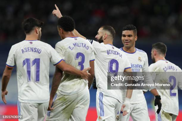 Karim Benzema of Real Madrid CF celebrates scoring their second goal with teammates Daniel Carvajal , <Carlos Casemiro , Eder Gabriel Militao and...