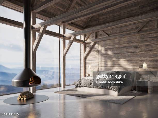 wooden cabin bedroom - luxury bedroom stock pictures, royalty-free photos & images