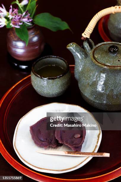 kusa mochi topped with red bean paste - tricyrtis hirta stock pictures, royalty-free photos & images