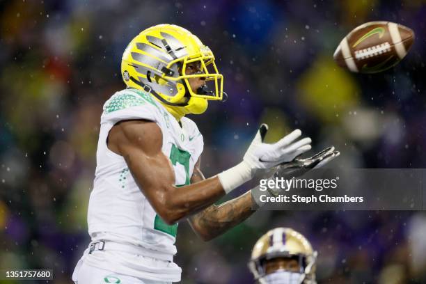 Devon Williams of the Oregon Ducks catches a touchdown pass against the Washington Huskies during the second quarter at Husky Stadium on November 06,...
