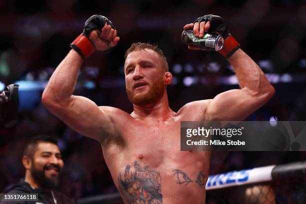 Justin Gaethje celebrates after his decision victory over Michael Chandler in their lightweight bout during the UFC 268 event at Madison Square...