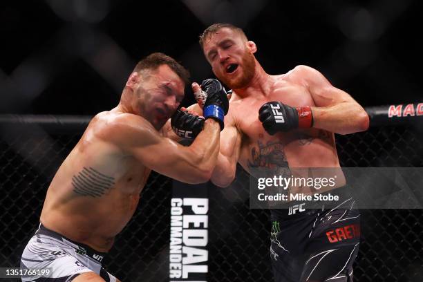 Justin Gaethje punches Michael Chandler in their lightweight bout during the UFC 268 event at Madison Square Garden on November 06, 2021 in New York...
