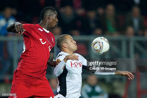 Douglas of FC Twente,Bobby Zamora of Fulham during the Europa League match between FC Twente and Fulham FC at the Grolsch Veste Stadium on December...