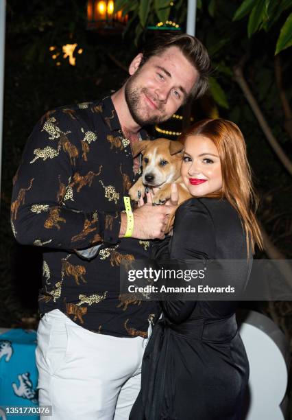 Actor Luke Benward and actress Ariel Winter meet "Cupid" the dog at the Wags & Walks 10th Annual Gala at the Taglyan Complex on November 06, 2021 in...