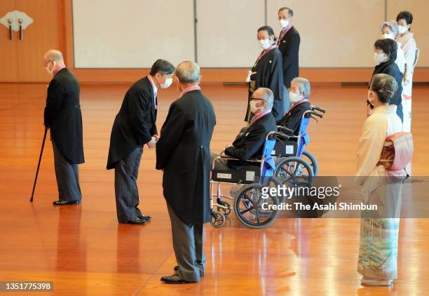 Emperor Naruhito talks to Shigeo Nagashima during the Order of Culture Award Ceremony at the Imperial Palace on November 3, 2021 in Tokyo, Japan.