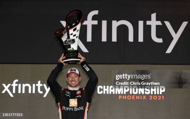 Daniel Hemric, driver of the Poppy Bank Toyota, celebrates in victory lane after winning the NASCAR Xfinity Series Championship at Phoenix Raceway on...