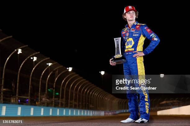 Jesse Love, driver of the NAPA Auto Parts Toyota, poses for photos after winning the 2021 ARCA Menards Series Championship in the ARCA Arizona...