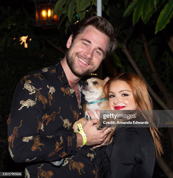Actress Ariel Winter and actor Luke Benward meet "Cupid" the dog at the Wags & Walks 10th Annual Gala at the Taglyan Complex on November 06, 2021 in...
