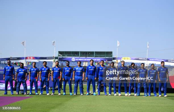 Players of Afghanistan line up for the National Anthems ahead of the ICC Men's T20 World Cup match between New Zealand and Afghanistan at Sheikh...