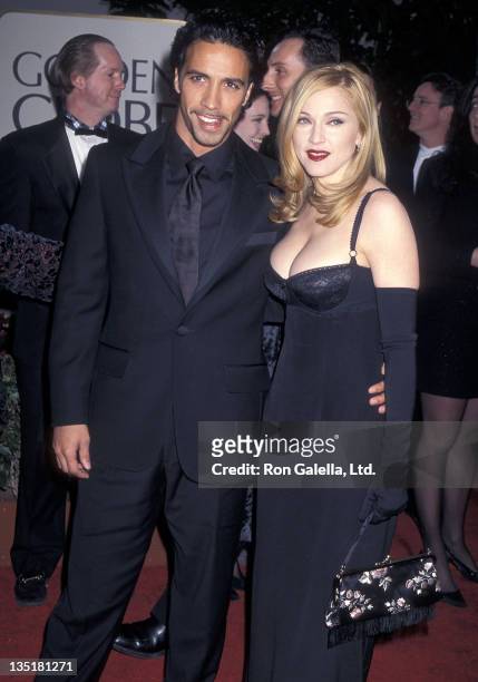 Singer Madonna and boyfriend Carlos Leon attend the 54th Annual Golden Globe Awards on January 19, 1997 at the Beverly Hilton Hotel in Beverly Hills,...