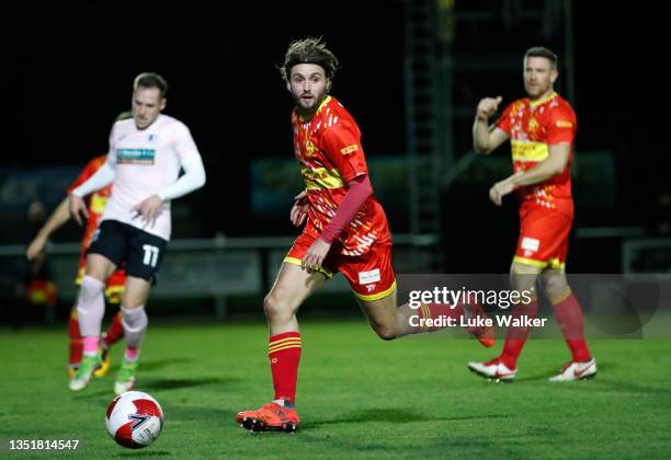 Giorgio Rassulo of Banbury United passes the ball during the Emirates FA Cup First Round match between Banbury United and Barrow at Spencer Stadium...
