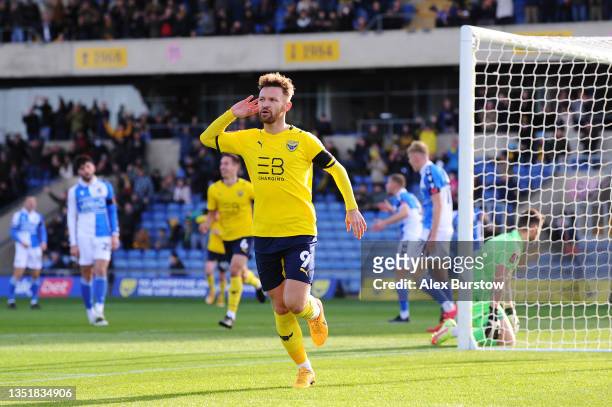 Matty Taylor of Oxford United celebrates scoring their team's first goal during the Emirates FA Cup First Round match between Oxford United and...