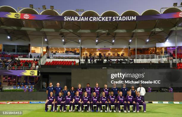 Players of Scotland pose for a team picture ahead of the ICC Men's T20 World Cup match between Pakistan and Scotland at Sharjah Cricket Stadium on...