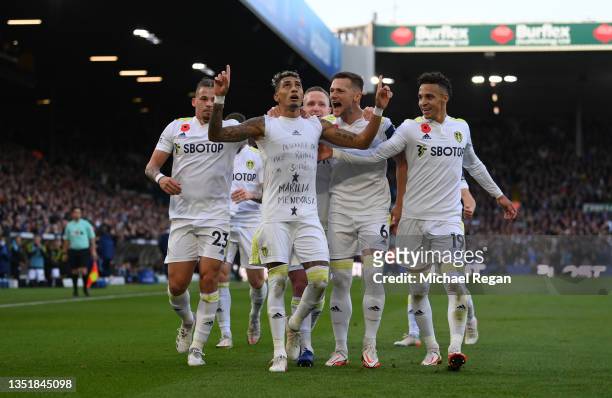 Raphinha of Leeds United celebrates with team mates after scoring their sides first goal during the Premier League match between Leeds United and...