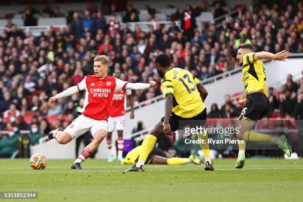 Emile Smith Rowe of Arsenal scores their side's first goal during the Premier League match between Arsenal and Watford at Emirates Stadium on...