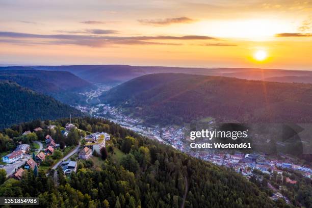 germany, baden-wurttemberg, bad wildbad, aerial view of town in black forest at summer sunset - black forest germany stock pictures, royalty-free photos & images