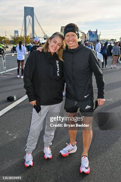 Nicole Briscoe and Ryan Briscoe are seen during the 2021 TCS New York City Marathon on November 07, 2021 in New York City.