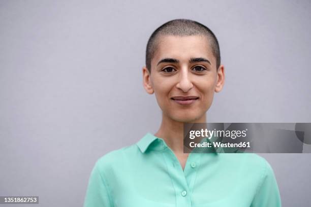 portrait of a confident woman with short hair - shaved head stock pictures, royalty-free photos & images