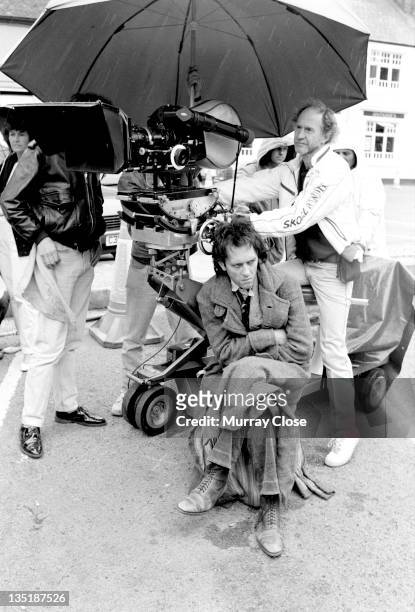 British actor Richard E. Grant films a scene in Stony Stratford, Buckinghamshire, for the movie 'Withnail & I', 1986.