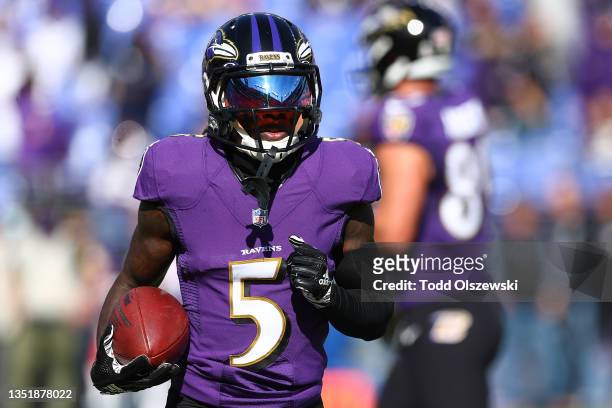 Marquise Brown of the Baltimore Ravens warms up before the game against the Minnesota Vikings at M&T Bank Stadium on November 07, 2021 in Baltimore,...